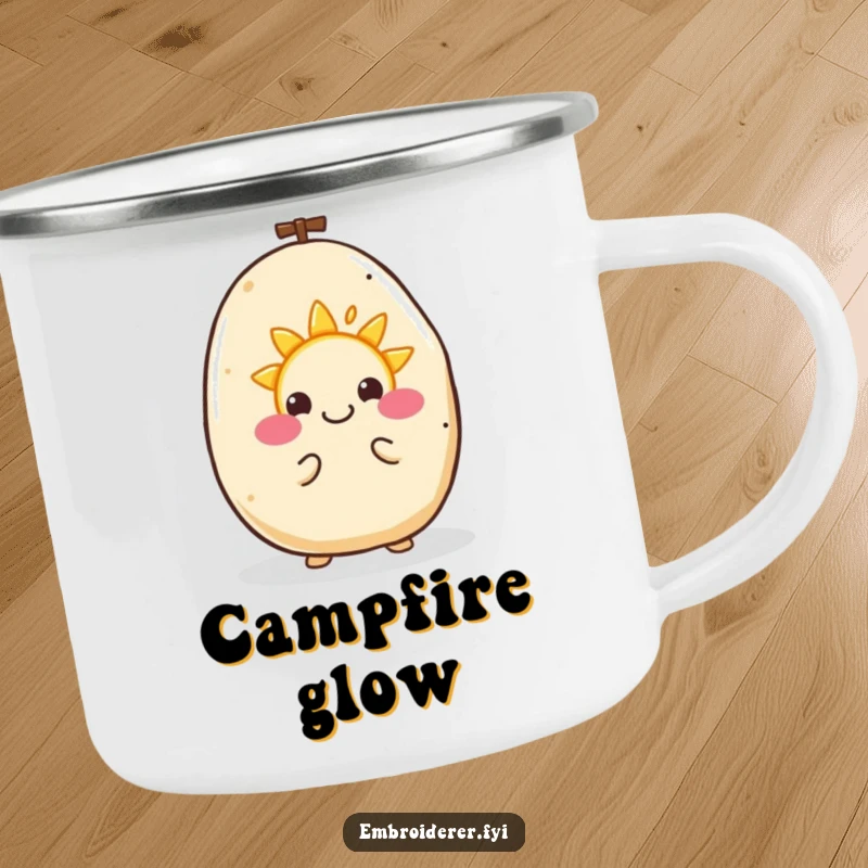 Funny camping mug showing a happy potato happily embroidering a tiny smiling sun, a cheerful companion.