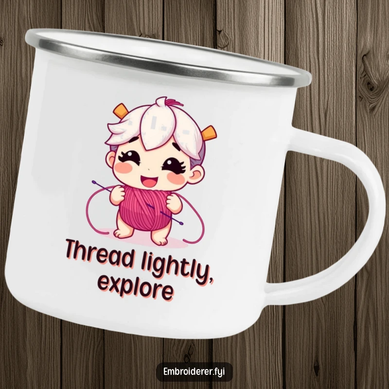 Funny camping mug with a playful character joyfully unspooling colorful embroidery floss, ideal for outdoor crafting enthusiasts.