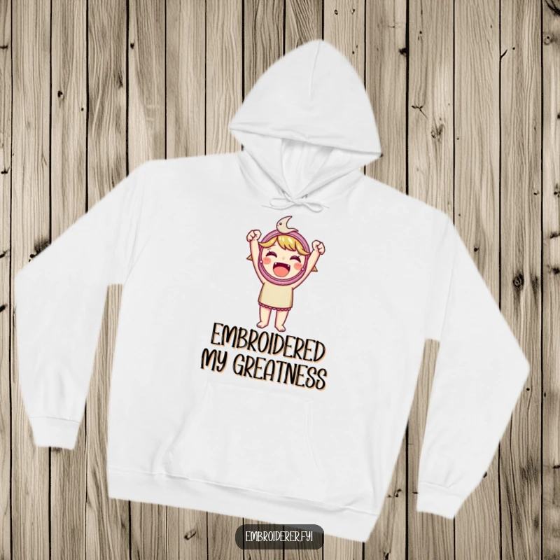 Funny embroidered patch hoodie, showing a character holding a gorgeous embroidered patch high, embodying triumphant crafting achievement.