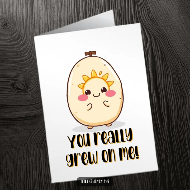 Funny free printable congratulations card featuring a happy potato busy embroidering a small, smiling sun, celebrating achievements with warmth.