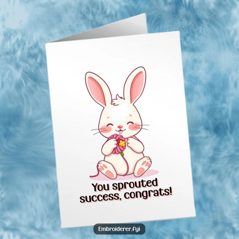 Funny free printable congratulations card: a cheerful rabbit embroiders a beautiful flower, marking a special occasion.